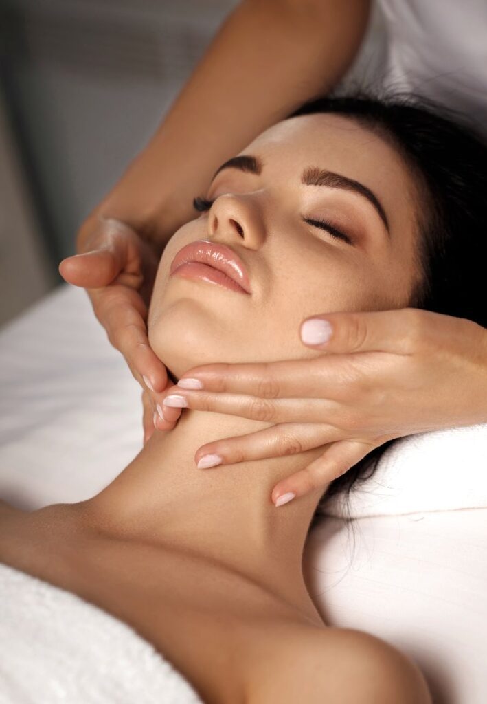 Woman with bright hydrated skin receiving treatment at a med spa